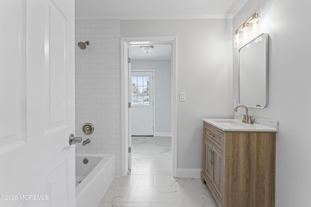 bathroom featuring tiled shower / bath combo, vanity, and ornamental molding