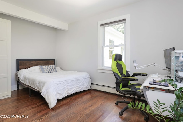 bedroom featuring dark hardwood / wood-style floors and multiple windows