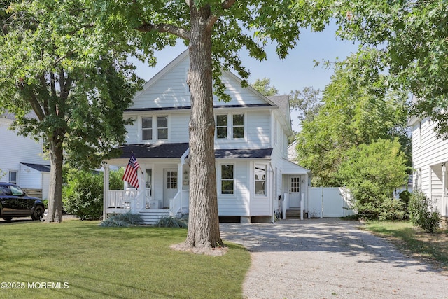 view of front facade with a porch and a front yard