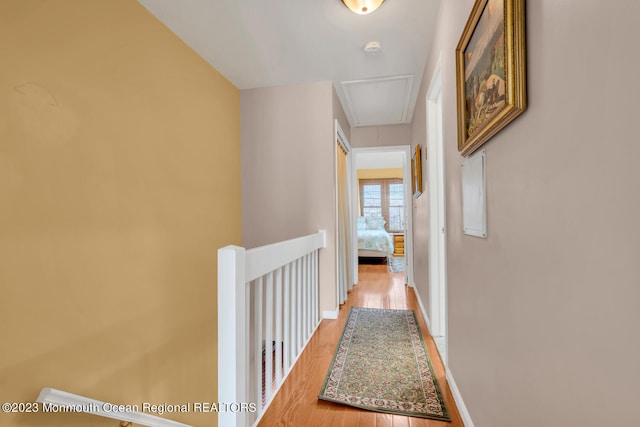 hallway with light wood-type flooring