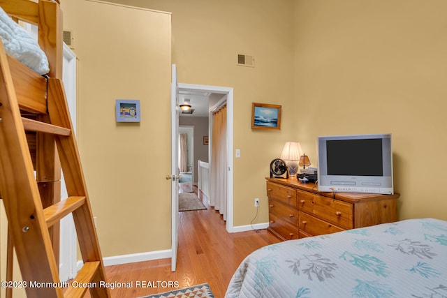 bedroom featuring light wood-type flooring