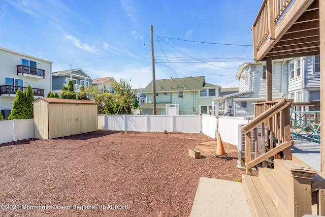 view of yard with a shed