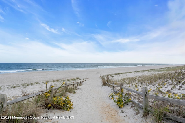 property view of water with a beach view