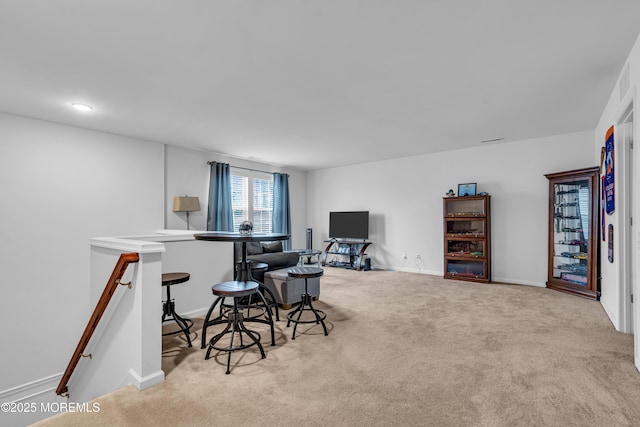 interior space featuring light colored carpet