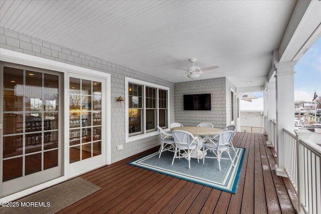 wooden deck with ceiling fan