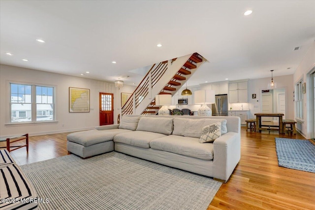 living room featuring light wood-type flooring