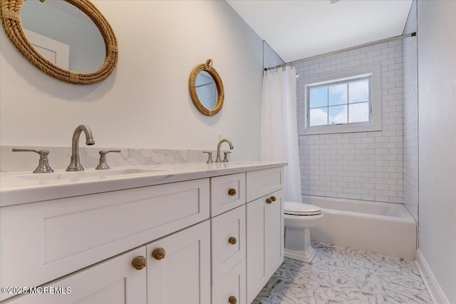 full bathroom featuring shower / bath combo with shower curtain, vanity, and toilet