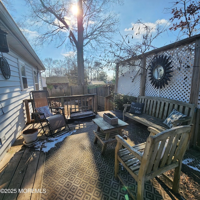 deck featuring a fire pit