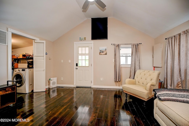 sitting room featuring ceiling fan, dark hardwood / wood-style flooring, lofted ceiling, and washer / clothes dryer