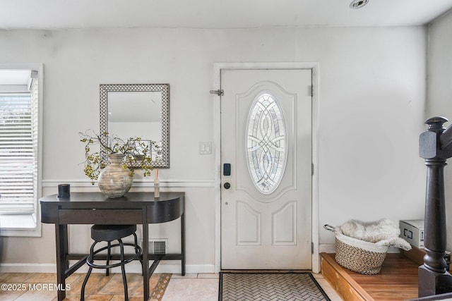 view of tiled entrance foyer