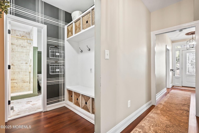 mudroom with dark hardwood / wood-style floors