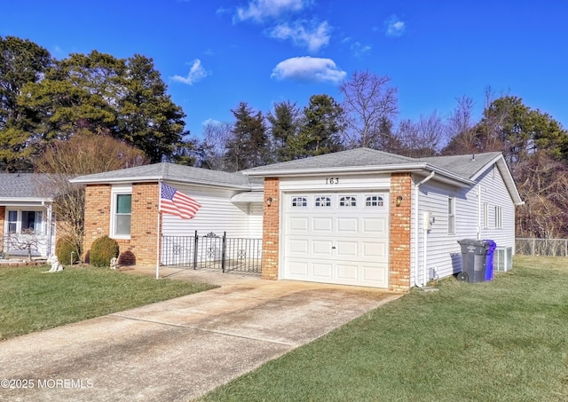 ranch-style home with a front lawn and a garage