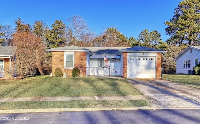 ranch-style home with a garage, cooling unit, and a front lawn