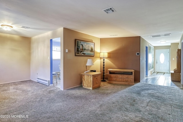 unfurnished bedroom featuring light colored carpet and a baseboard heating unit