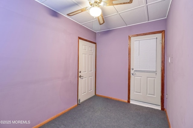 carpeted empty room with ceiling fan