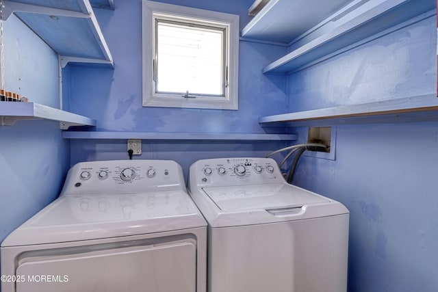 laundry area with washing machine and dryer