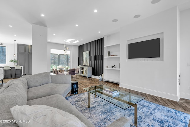 living room featuring built in shelves