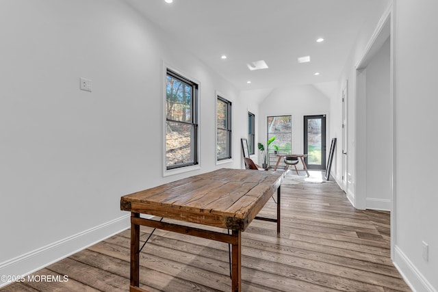 dining space featuring light wood-type flooring