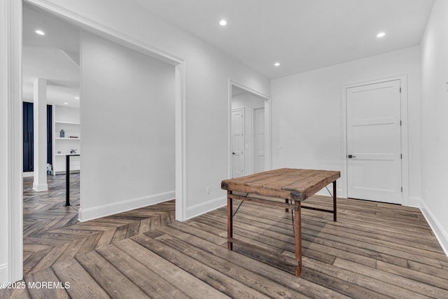 corridor with dark parquet floors