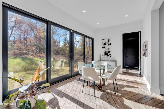 dining room featuring light parquet flooring