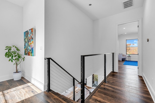 hall featuring dark wood-type flooring