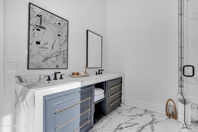 bathroom with a shower with door and vanity