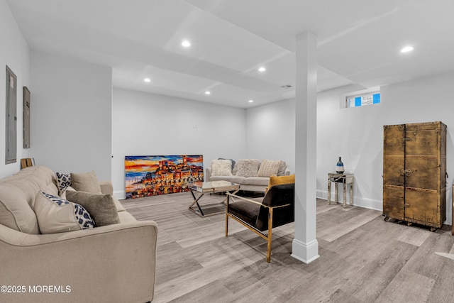 living room with light hardwood / wood-style flooring