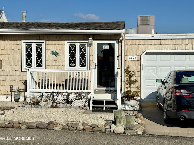 property entrance with a garage