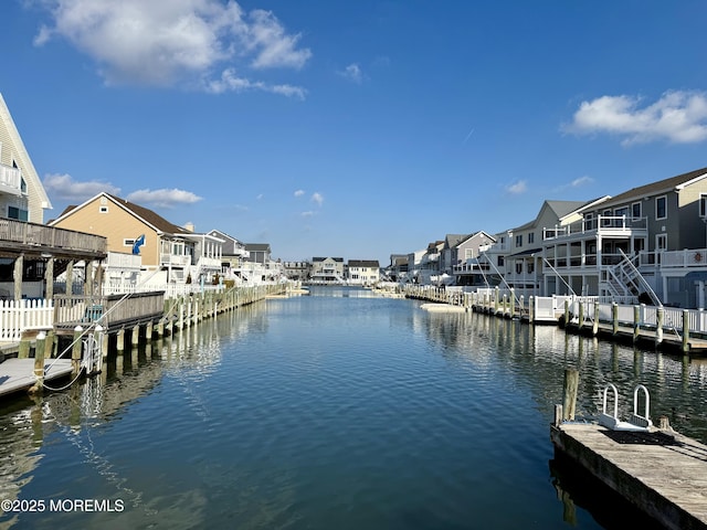 dock area featuring a water view