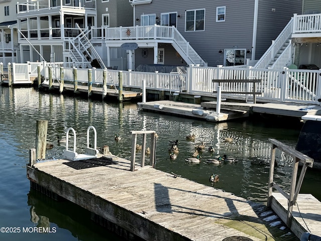 view of dock with a water view