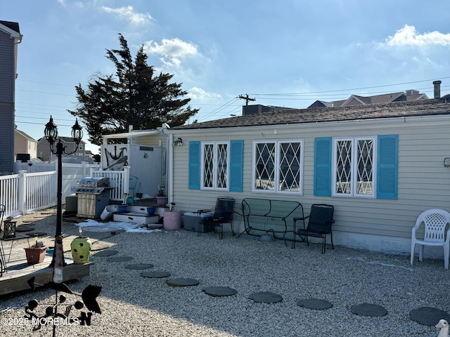 rear view of house with a patio area