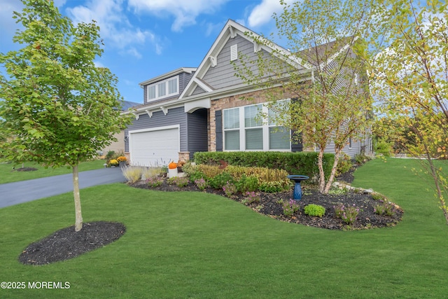 craftsman-style house featuring a front lawn and a garage