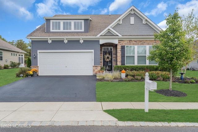 craftsman-style home featuring a front lawn