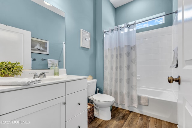 full bathroom with shower / tub combo, toilet, vanity, and wood-type flooring