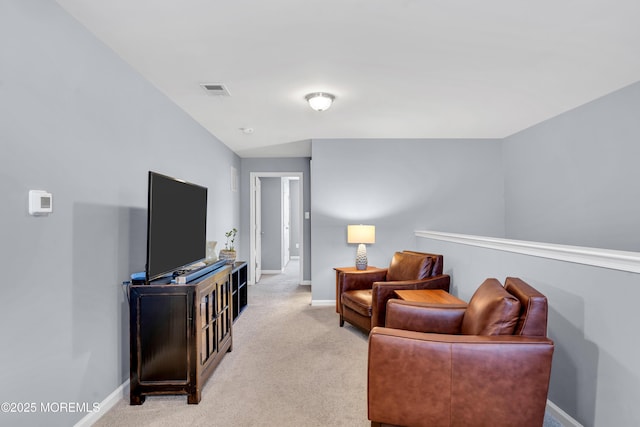 living room featuring light carpet