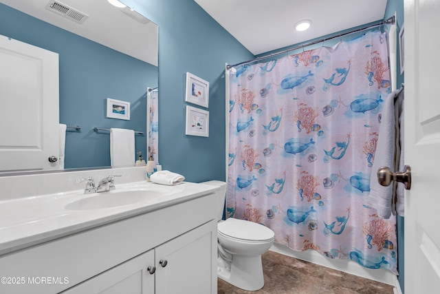 full bathroom with toilet, vanity, and shower / tub combo with curtain