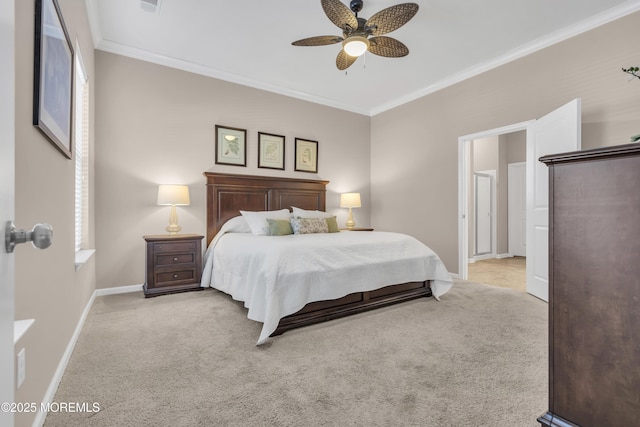 carpeted bedroom featuring ornamental molding and ceiling fan