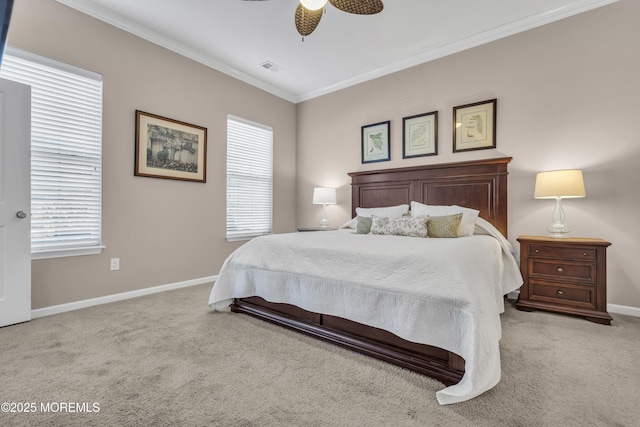 bedroom featuring light carpet, ceiling fan, and crown molding