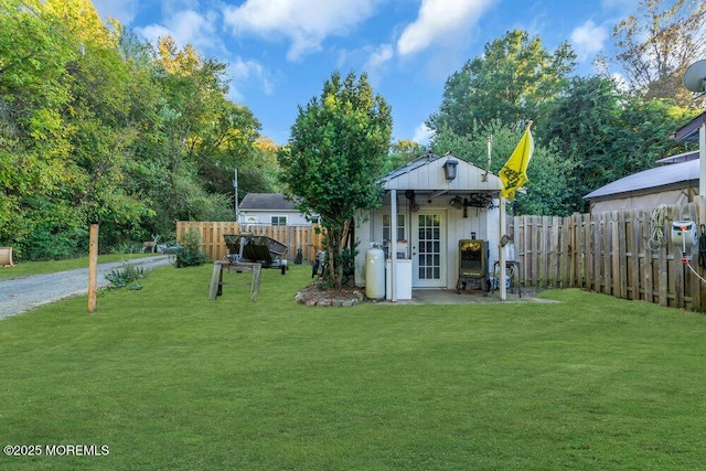 view of outdoor structure with a yard