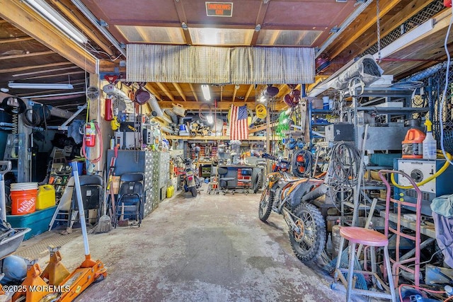 garage with a workshop area