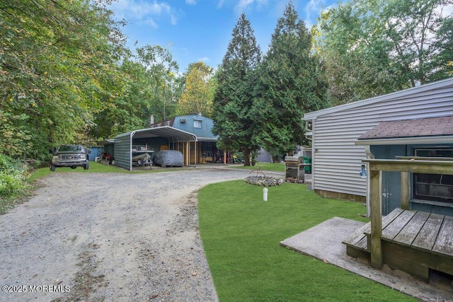 view of yard with a carport