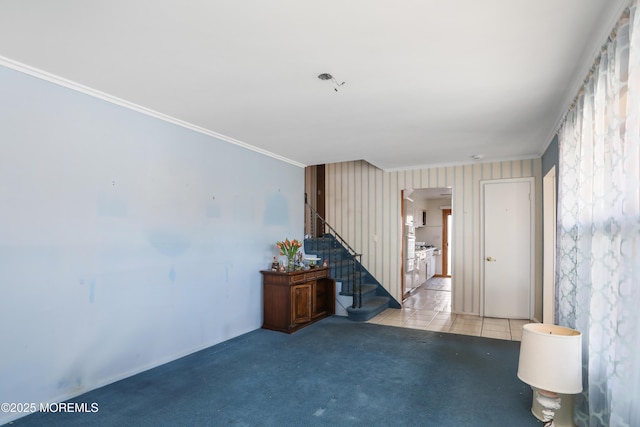 carpeted empty room with crown molding