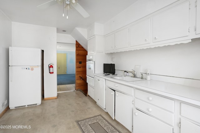 kitchen featuring sink, white appliances, ceiling fan, and white cabinets