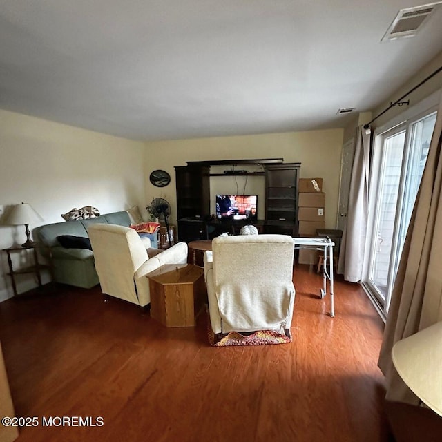 living room with wood-type flooring