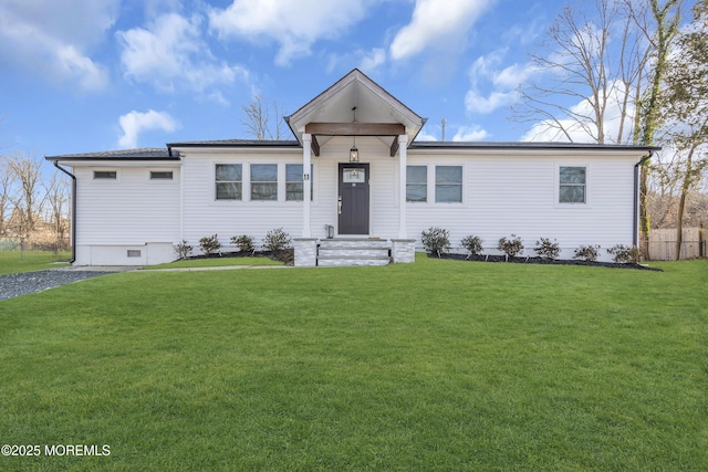 view of front facade with a front lawn