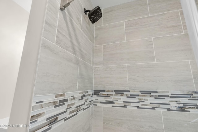 details with a tile shower