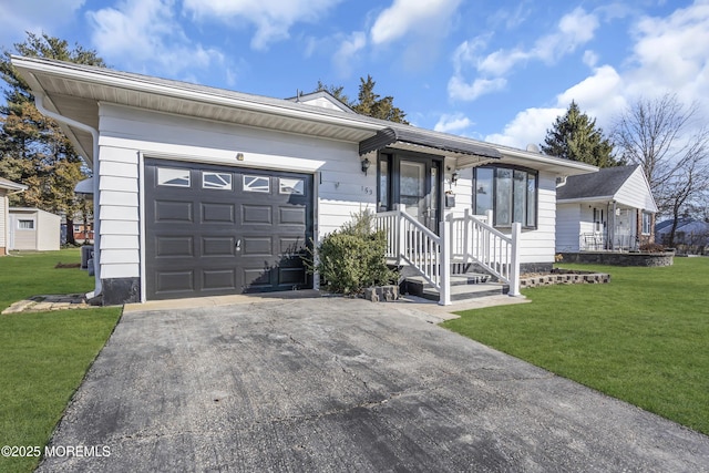 ranch-style house with a front yard and a garage