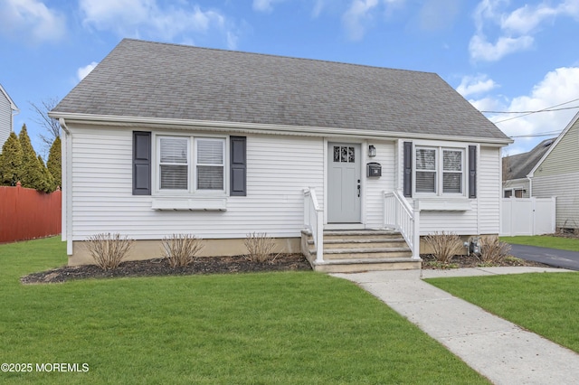 view of front facade featuring a front yard