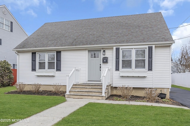 view of front of house with a front lawn