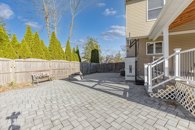 view of patio with central AC unit